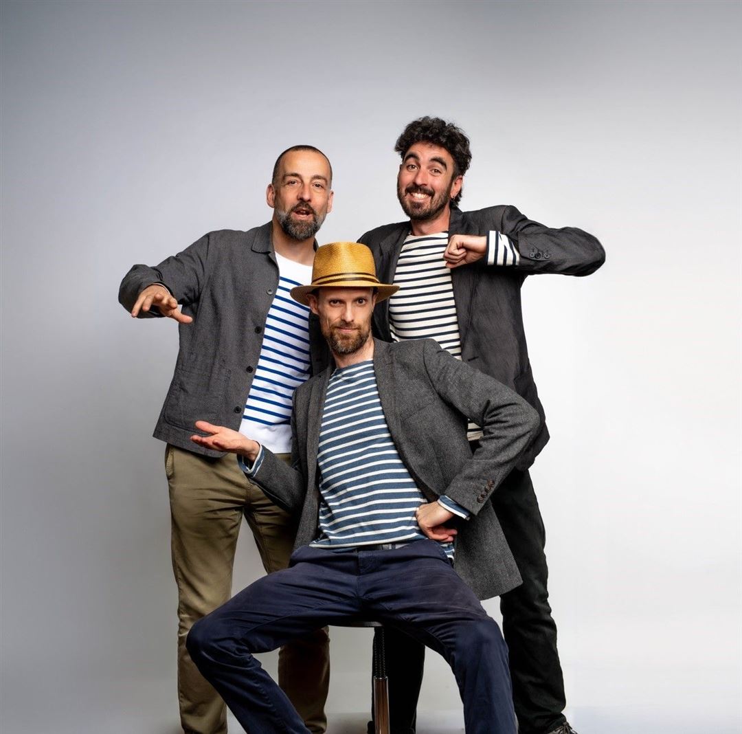 Bild von drei gut gelaunten M&auml;nnern.