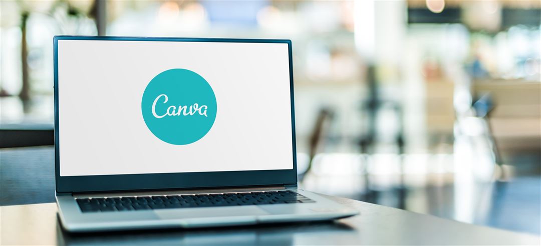 aufgeklappter Laptop mit ge&ouml;ffnetem Canva